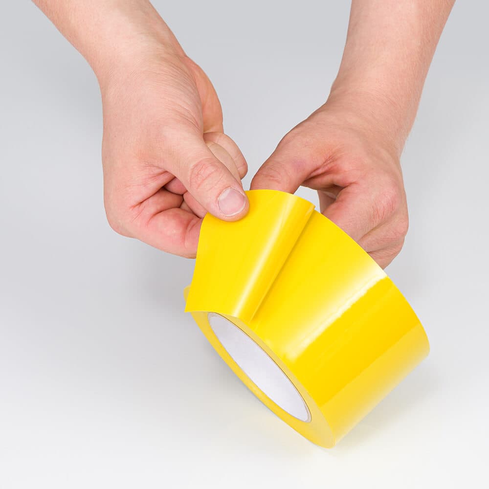 ytx-markierungsband-standard-plus-gelb-klebend-7-5-cm-33-m-rolle-praxis-klebeseite.jpg