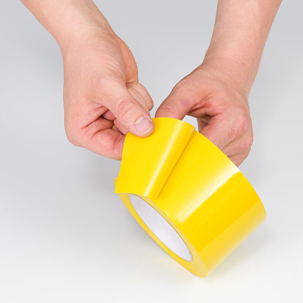 ytx-markierungsband-standard-plus-gelb-klebend-7-5-cm-33-m-rolle-praxis-klebeseite.jpg